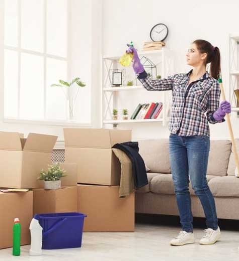 Woman cleaning house before moving out